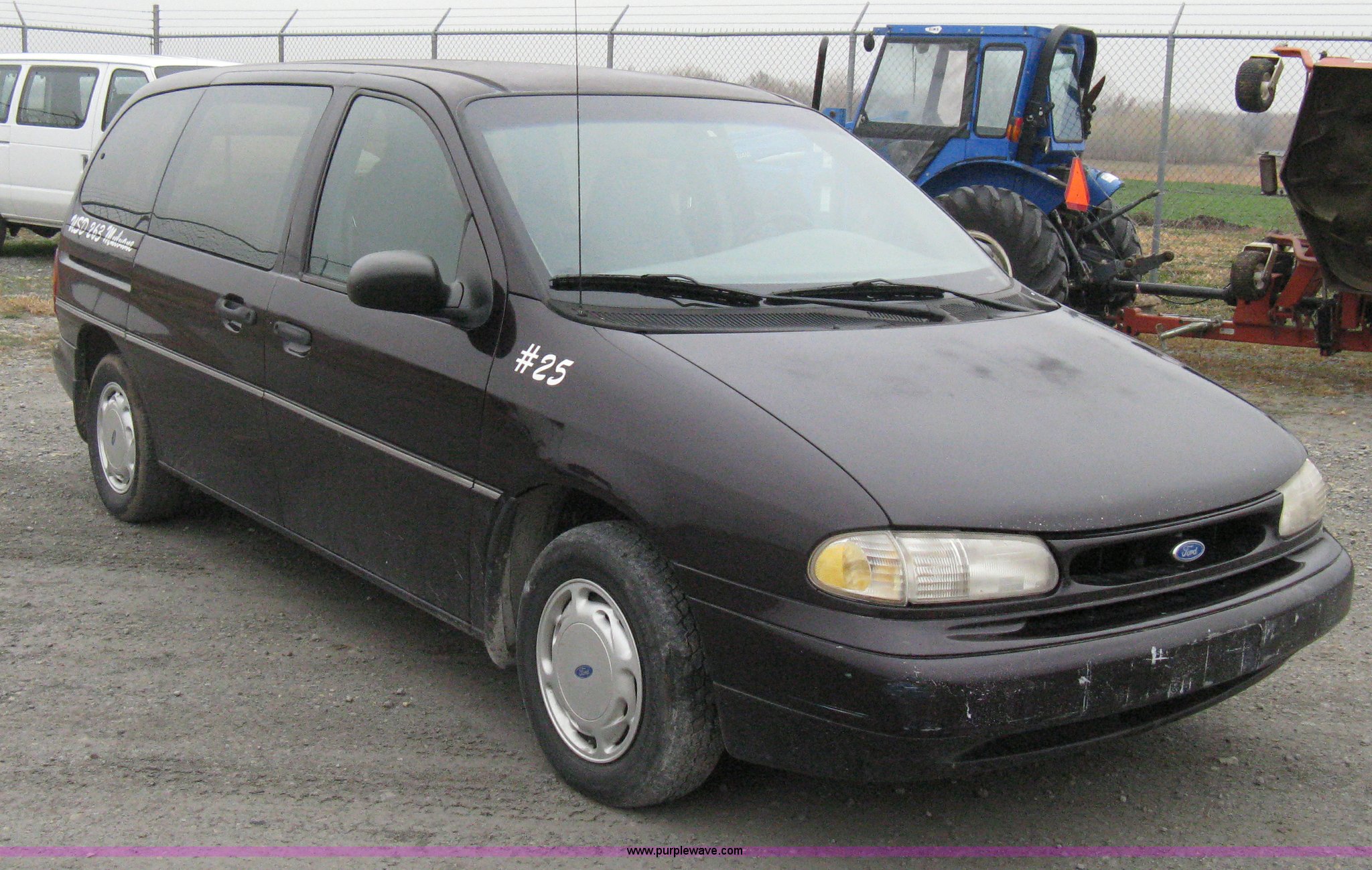1997 Ford Windstar six-passenger mini van in Mulvane, KS | Item A4479 sold  | Purple Wave