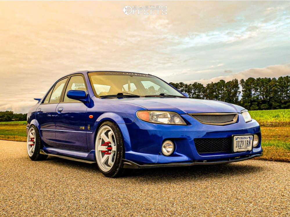 2001 Mazda Protege with 17x9 35 MST Mt01 and 205/45R17 Nitto Neo Gen and  Coilovers | Custom Offsets