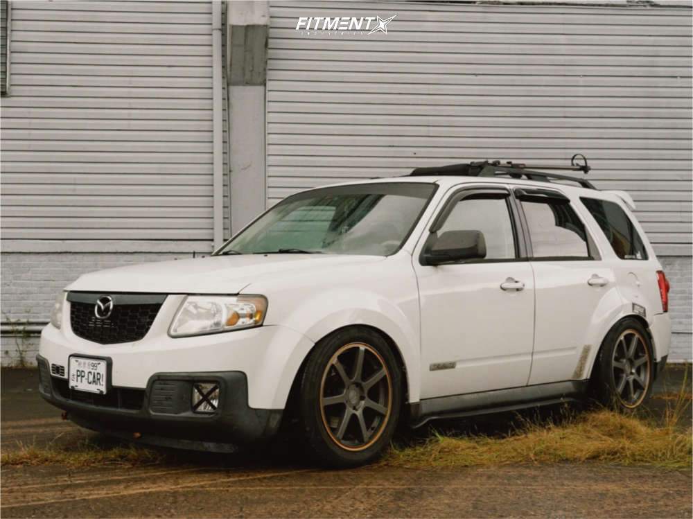 2008 Mazda Tribute i with 18x8 Motegi Mr132 and Continental 215x55 on  Coilovers | 1330601 | Fitment Industries