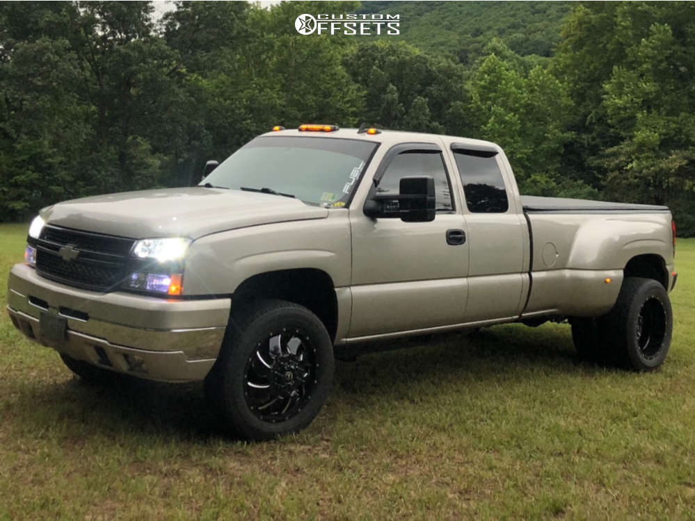 2006 Chevrolet Silverado 3500 with 20x8.25 -176 Fuel Cleaver and 265/60R20  Bridgestone Dueler H/T 685 and Level 2" Drop Rear | Custom Offsets