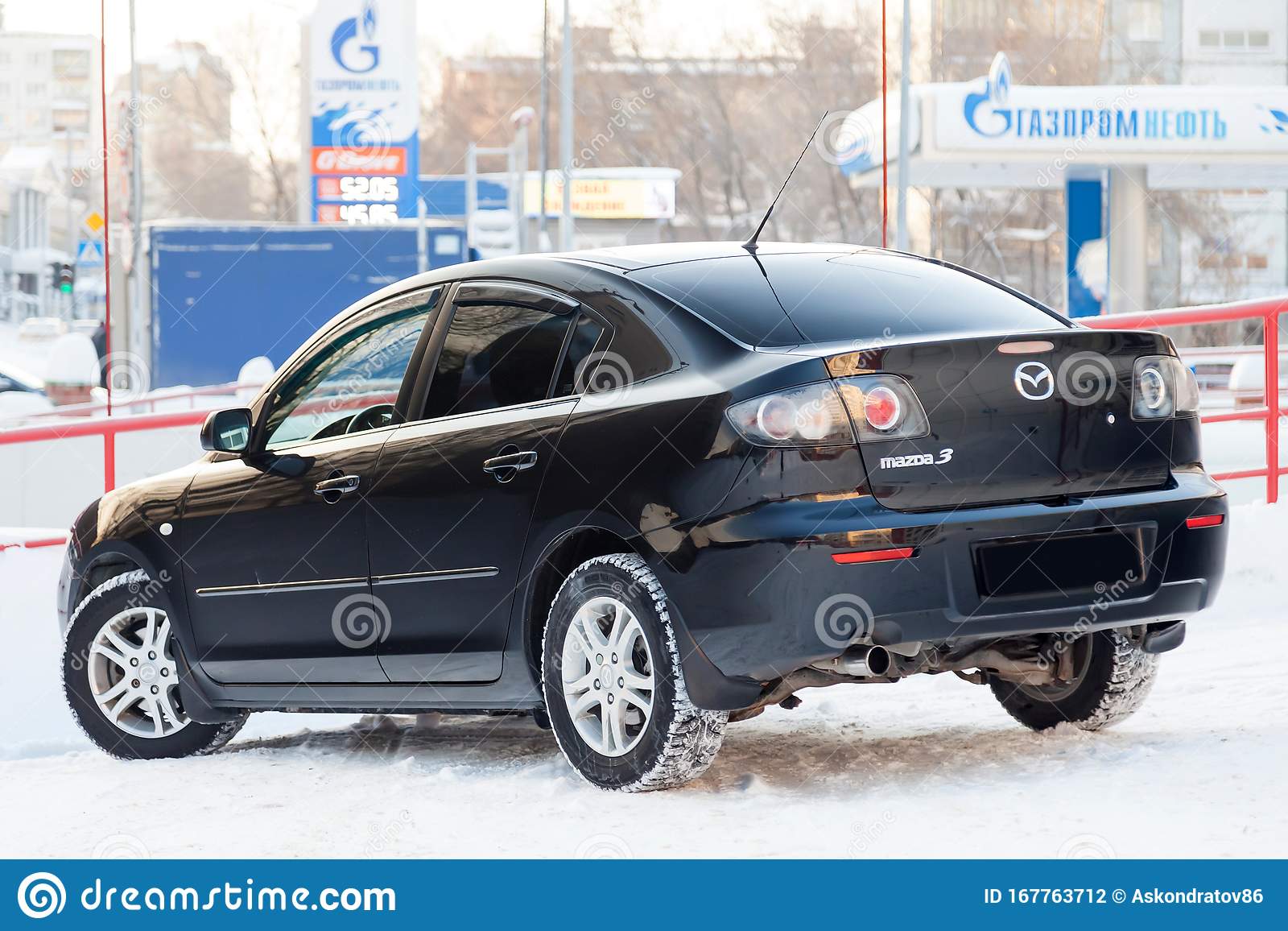 Black Mazda 3 2008 Year Rear View with Dark Gray Interior in Excellent  Condition in a Parking Space among Other Cars Editorial Photography - Image  of modern, family: 167763712
