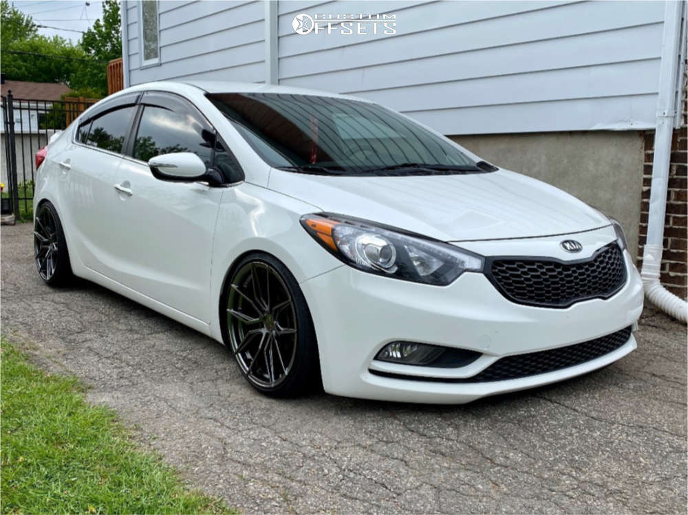 2016 Kia Forte with 18x8.5 35 XXR 559 and 215/35R18 Sailun Atrezzo and  Coilovers | Custom Offsets